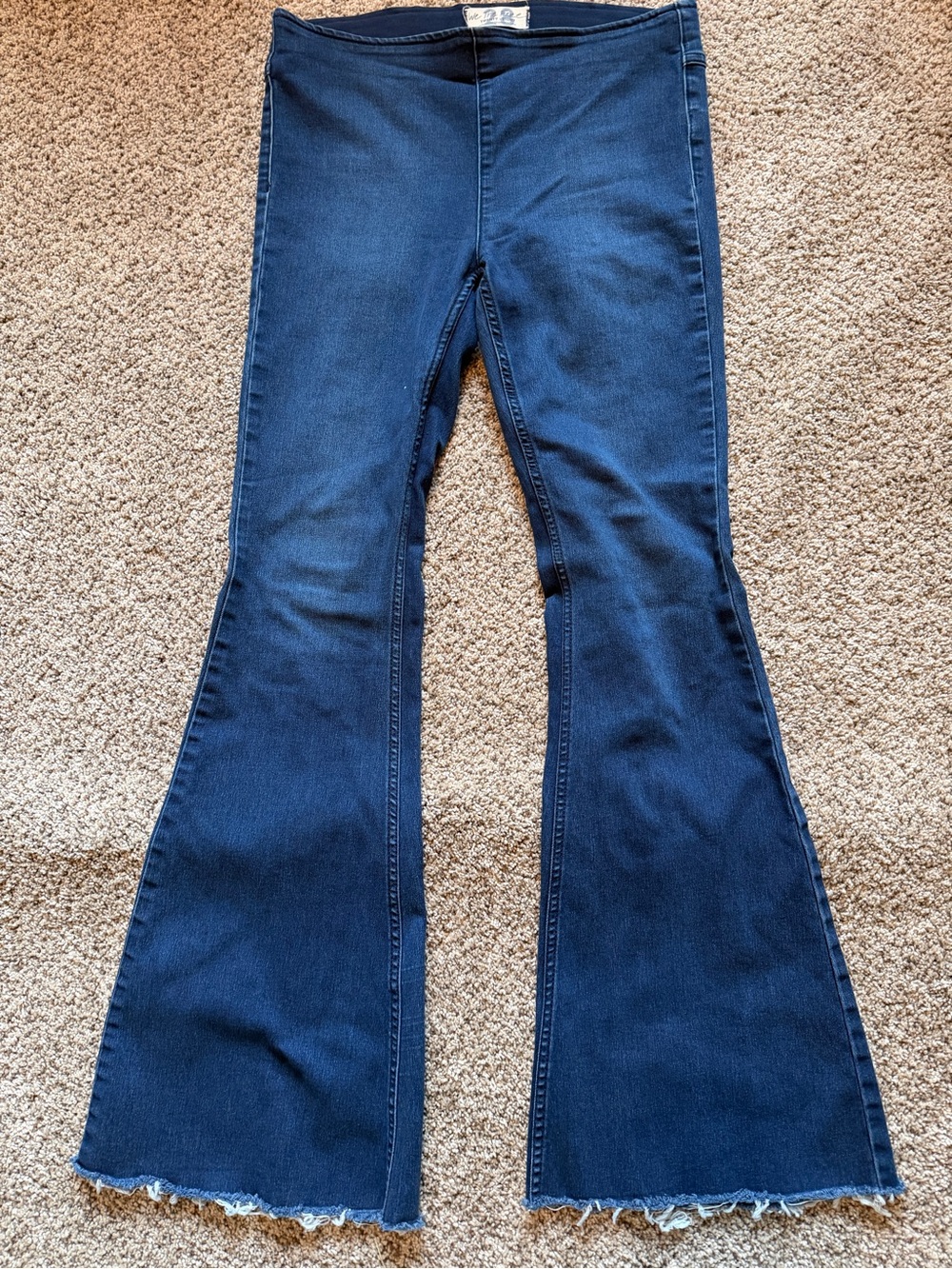 We The Free Pull-On Dark Blue Flare Jeans with Raw Hem Size 28